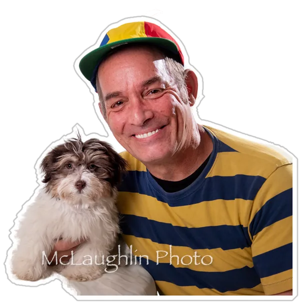 Mr. Twisty holding his puppy Oliver